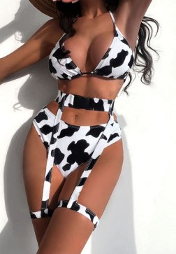 Playful Black and White Cow Pattern Swimwear